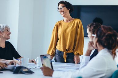 Women in a workplace meeting.