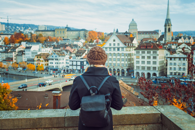 A person at the Lindenhof in the old town of Zurich.