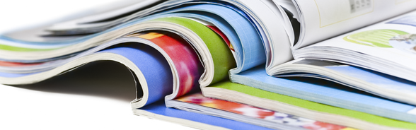 Open books piled on top of one another