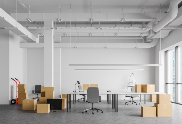 An office full of moving boxes 