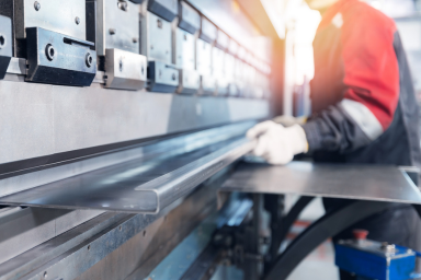 A metalworker in a factory