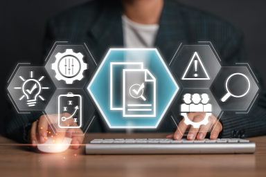 Una persona scrive al computer e appaiono dei pittogrammi di un’impronta digitale e di un lucchetto.